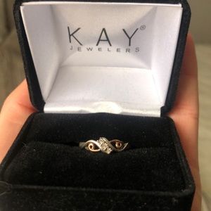Cute silver and rose gold ring with 3 diamonds